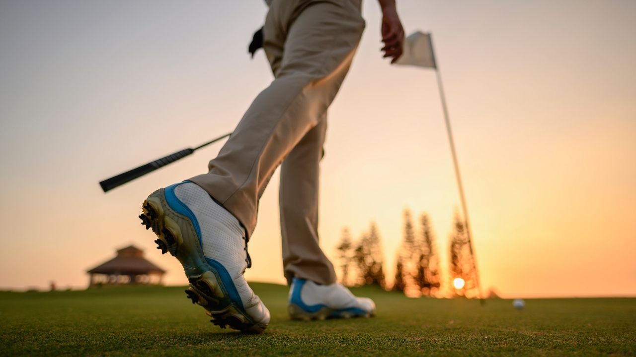 Golf course at sunset showing late afternoon twilight tee time lighting